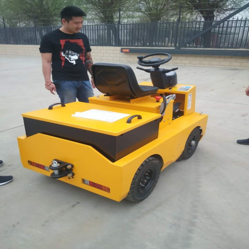 3噸電動牽引車座駕式小型拖車頭貨物電瓶牽引搬運車定制
